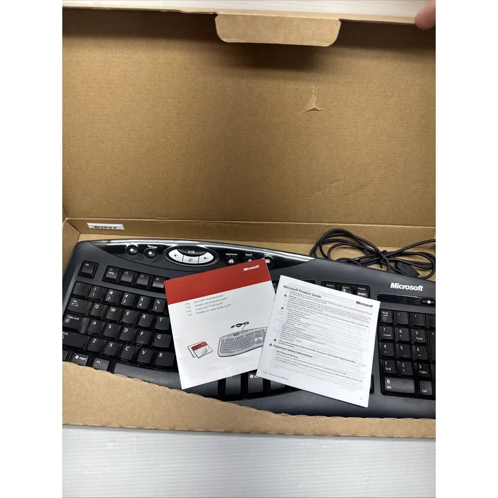 Microsoft Comfort Curve Keyboard 2000 Ergonomic Wired USB Black Model 1047